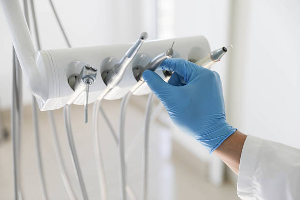 Professional Root Canal Treatment technician working in Oak Hills, CA